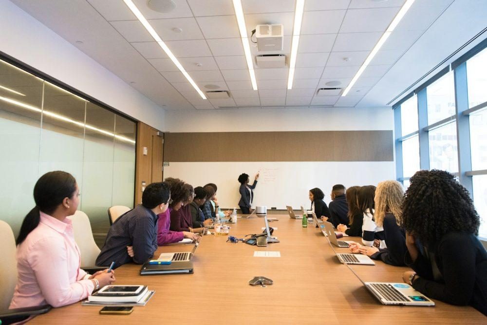 People in discussion at a conference table